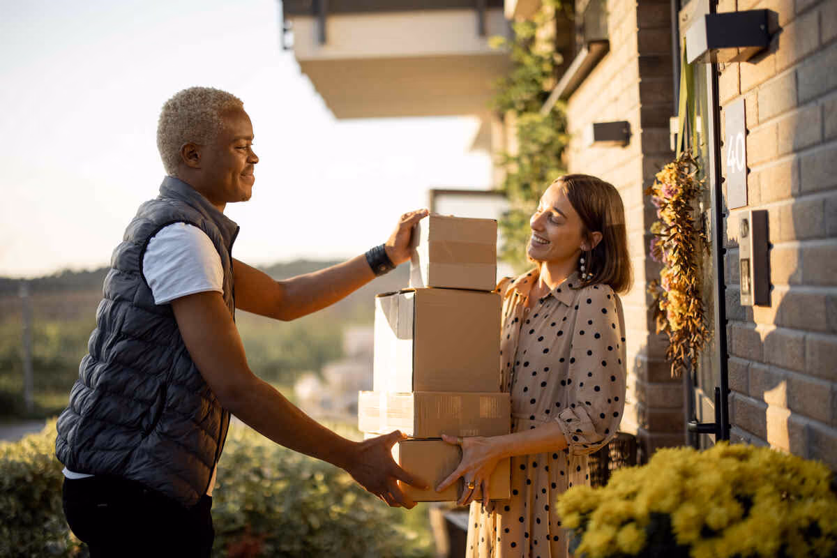 expedited delivery man bringing package